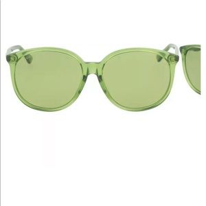 Gucci unisex round transparent green sunglasses